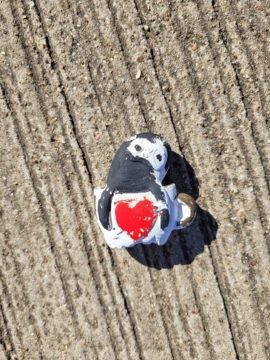 Little dude with a big heart in a tea cup